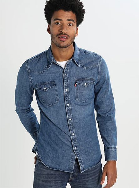 man in denim shirt