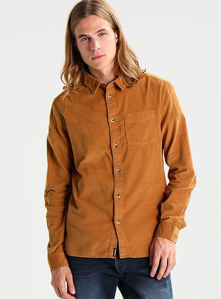 man in light brown shirt